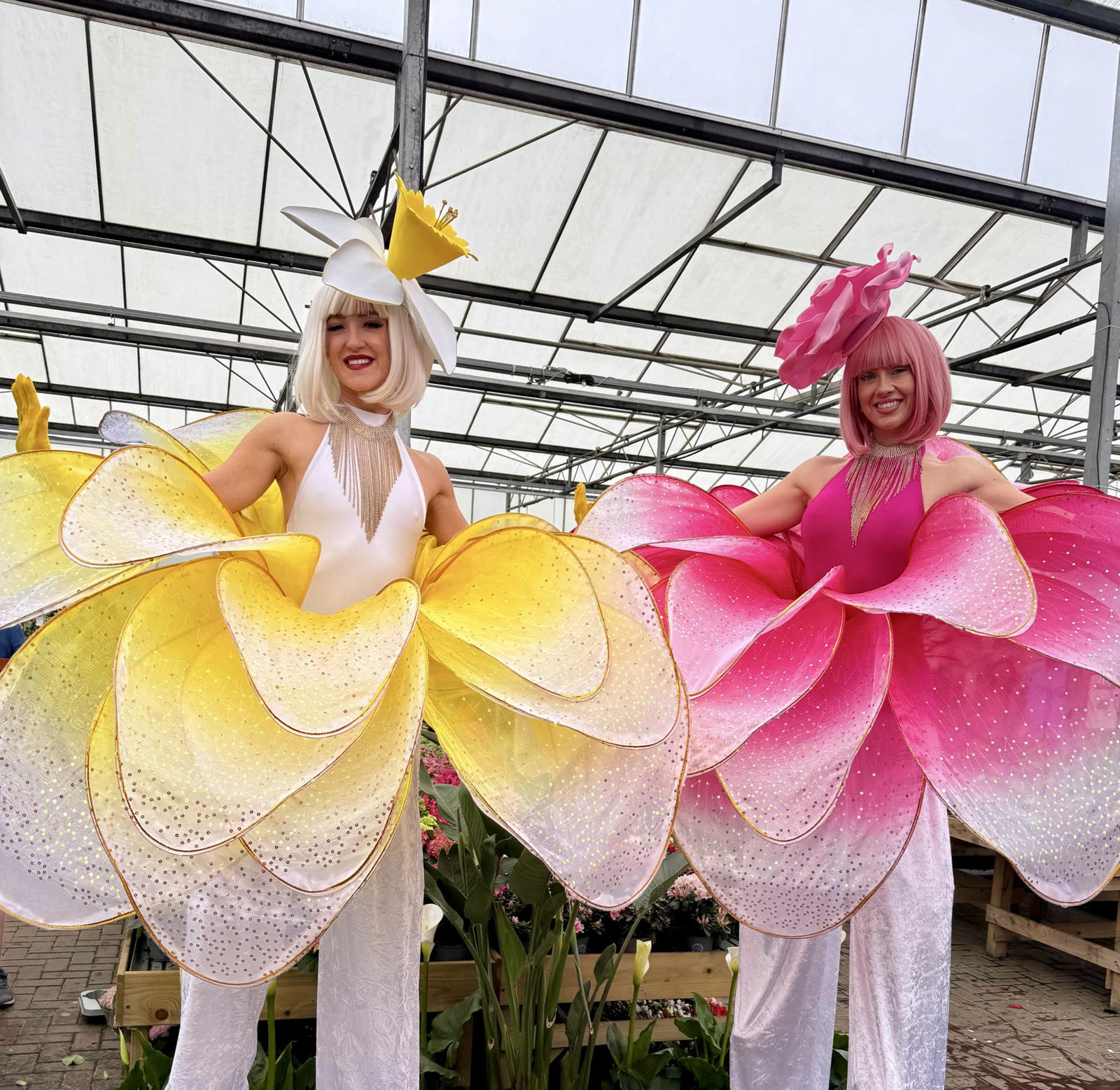Floral stilt walkers